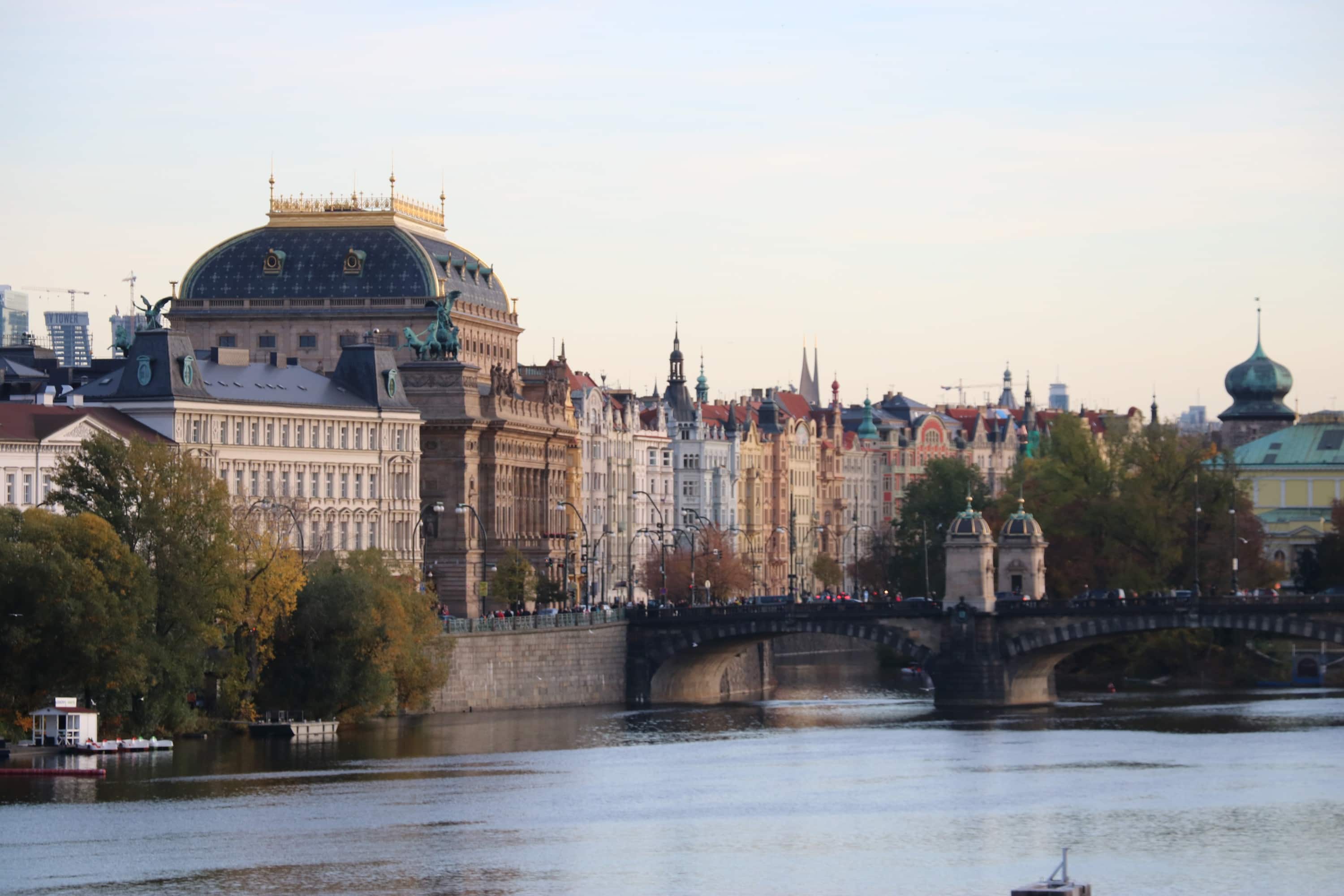 A view of the Prague Opera House across the Vltava River