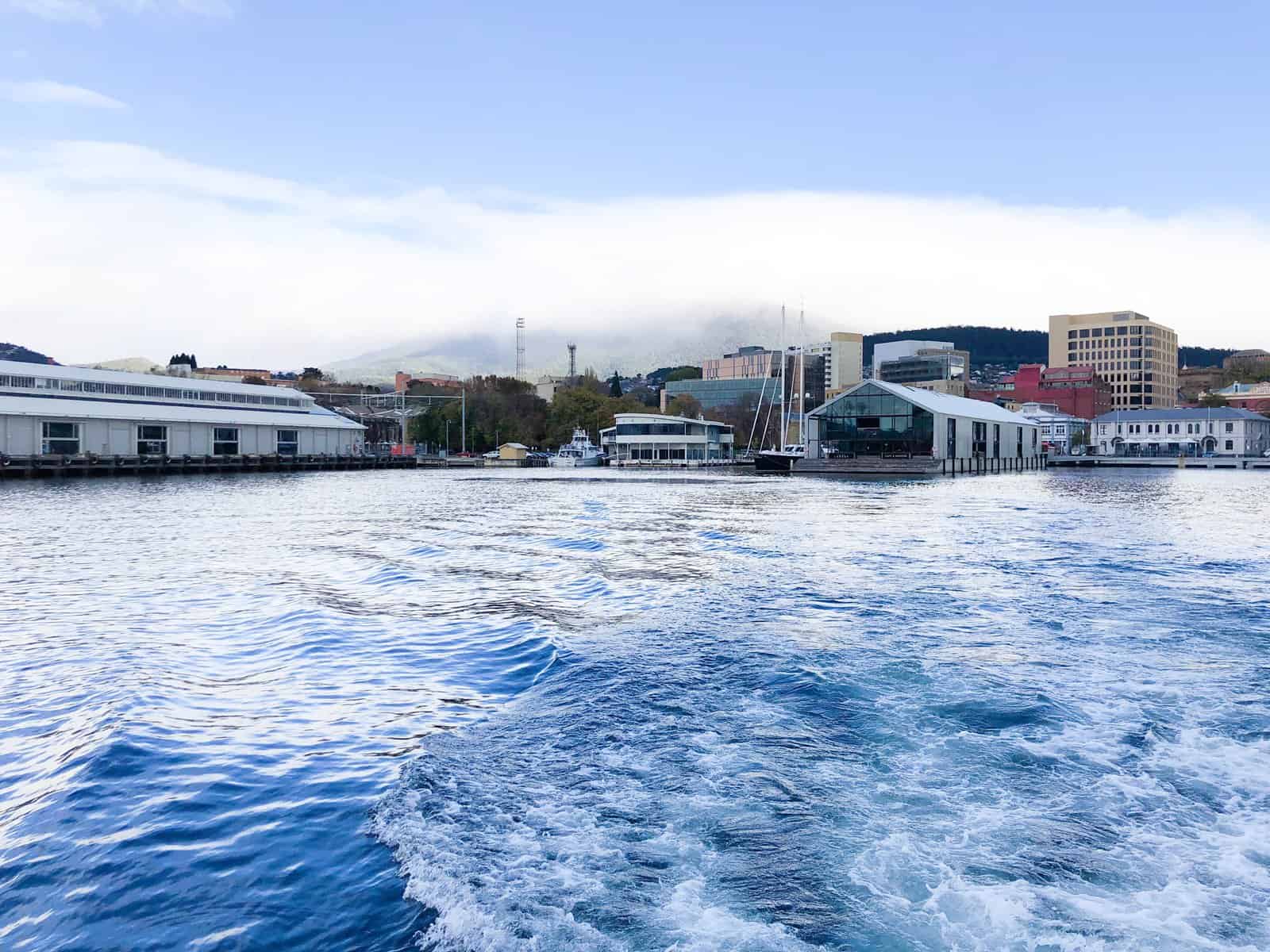 Waves in the river looking back towards the city of Hobart