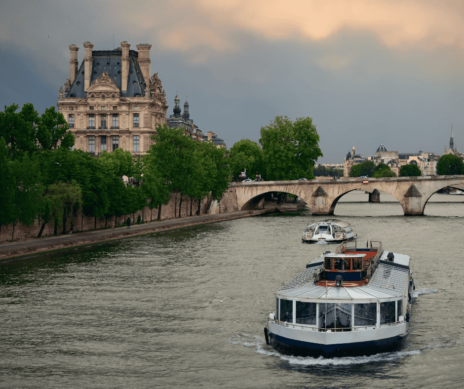 A boat cruising along the Seine River 