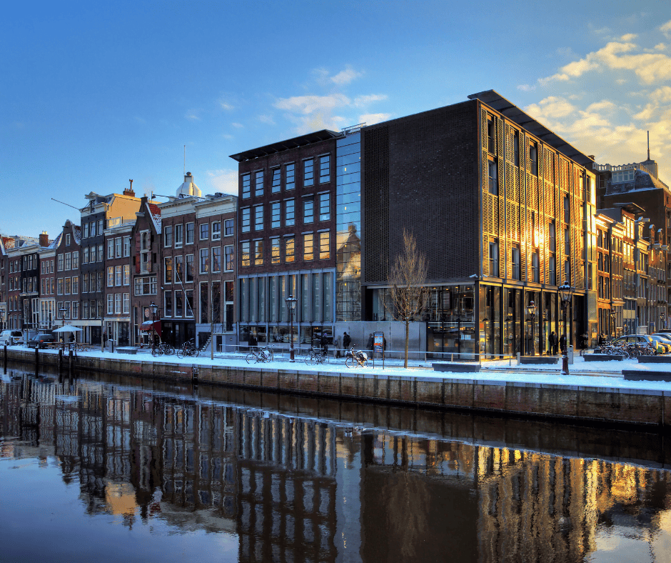 Anne Frank Huis in a row of buildings in front of the Amsterdam canals