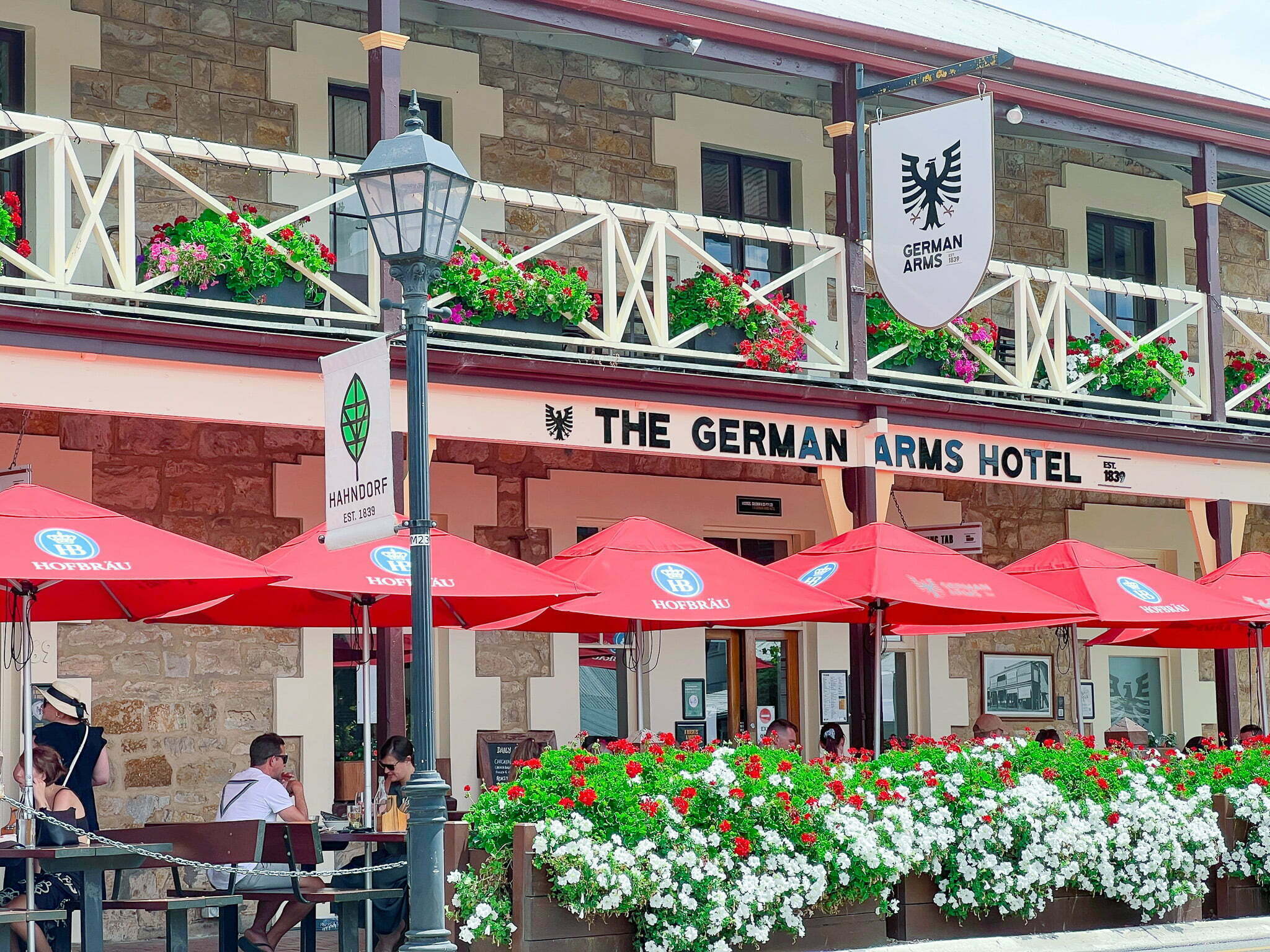 An European looking pub with a sign out the front saying "The German Arms Hotel"